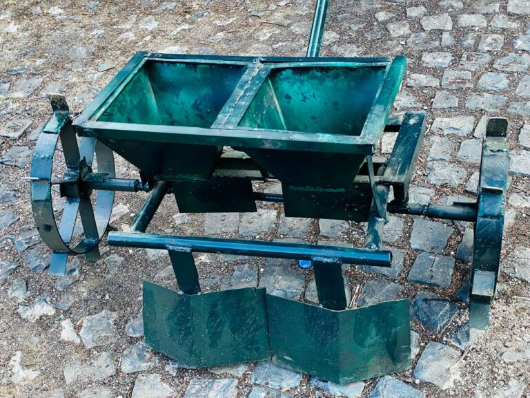 Manual row seeding and planting machine